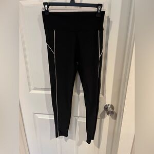 Sleek Black Leggings with White Trim